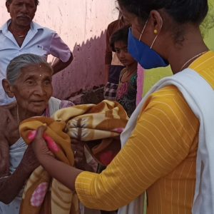 Blanket distribution at Kalahandi, Orissa